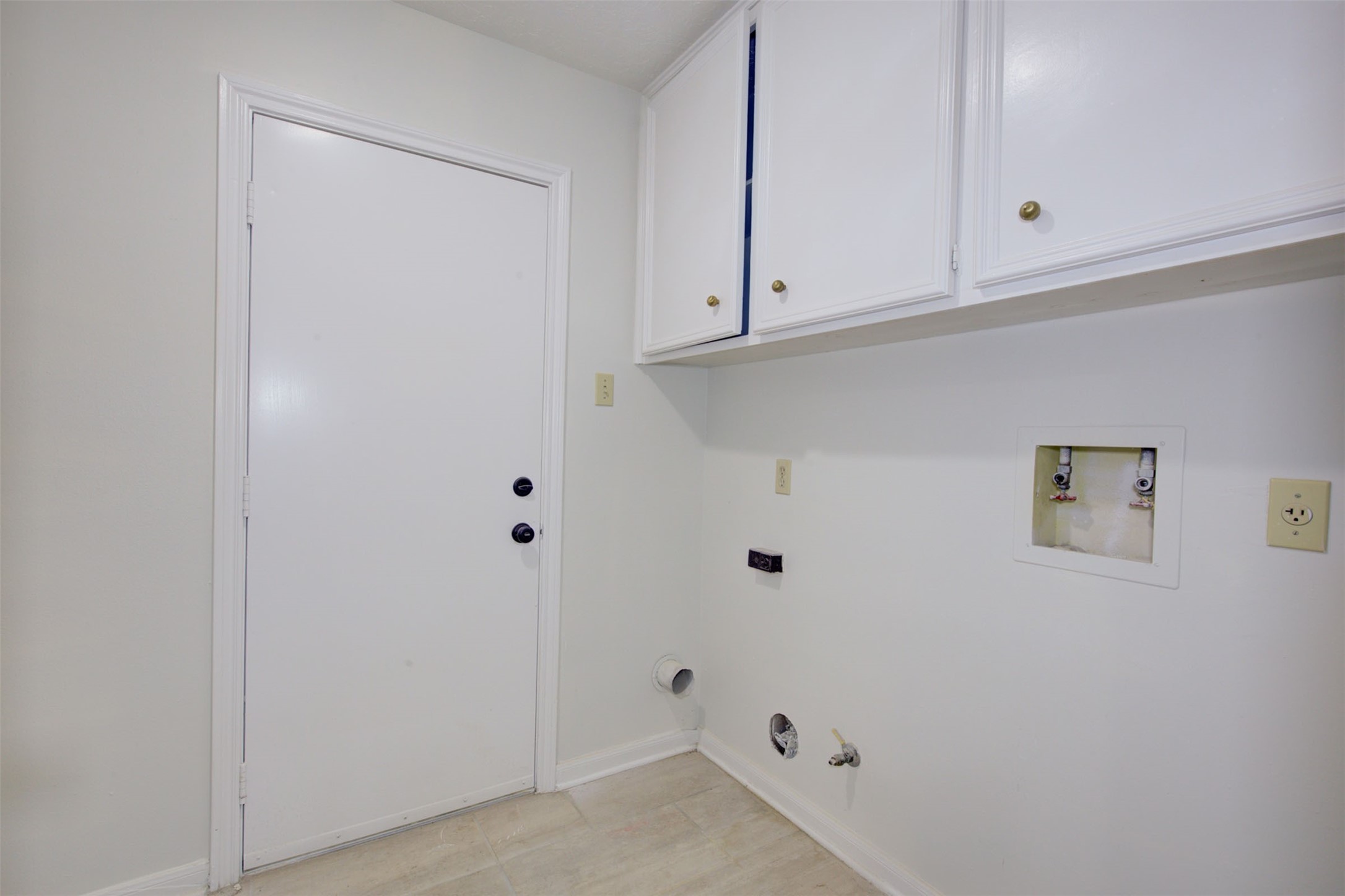 1402 Forest Home Drive Houston, TX 77077 - Photo 29 of 35 a view of white cabinets