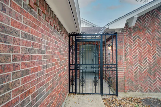 wooden floor in an empty room with a fireplace