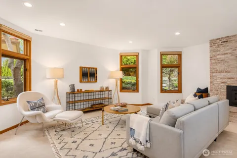 a room with furniture and a fireplace