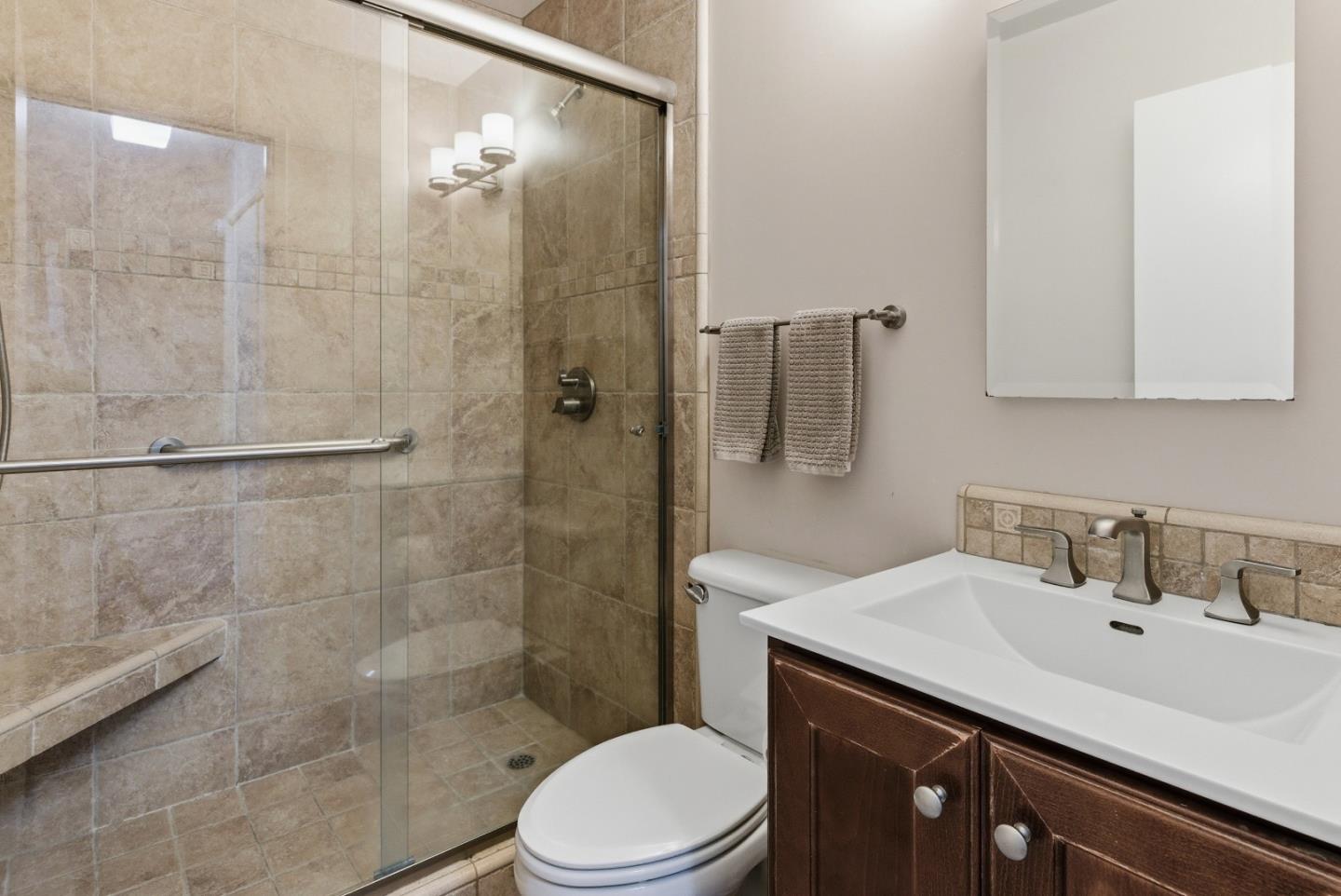 2661 Beach Road, Unit P75 Watsonville, CA 95076 - Photo 18 of 28 a bathroom with a sink toilet and shower