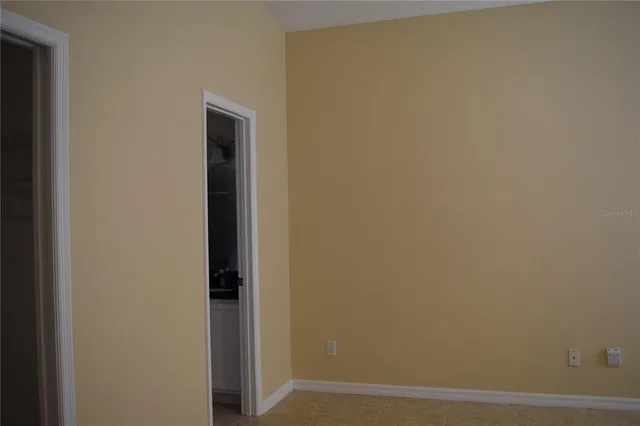 a view of hallway with closet