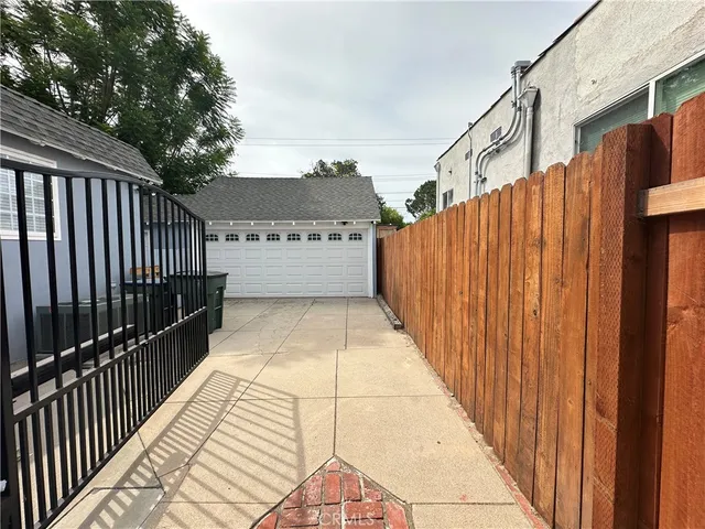 a view of balcony with wooden floor