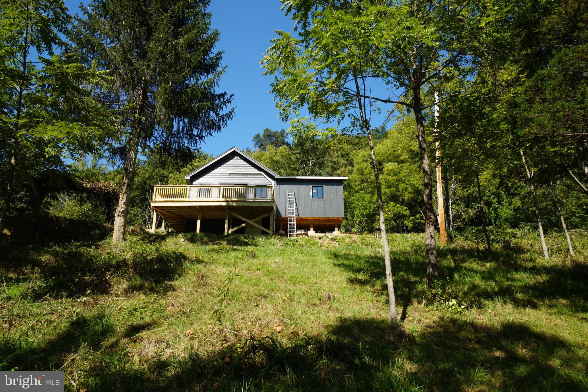 789 Upper South Branch Road Franklin, WV 26807 - Photo 1 of 50 a house view with a backyard space
