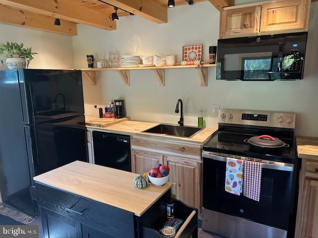 789 Upper South Branch Road Franklin, WV 26807 - Photo 17 of 50 a kitchen with a stove and a refrigerator