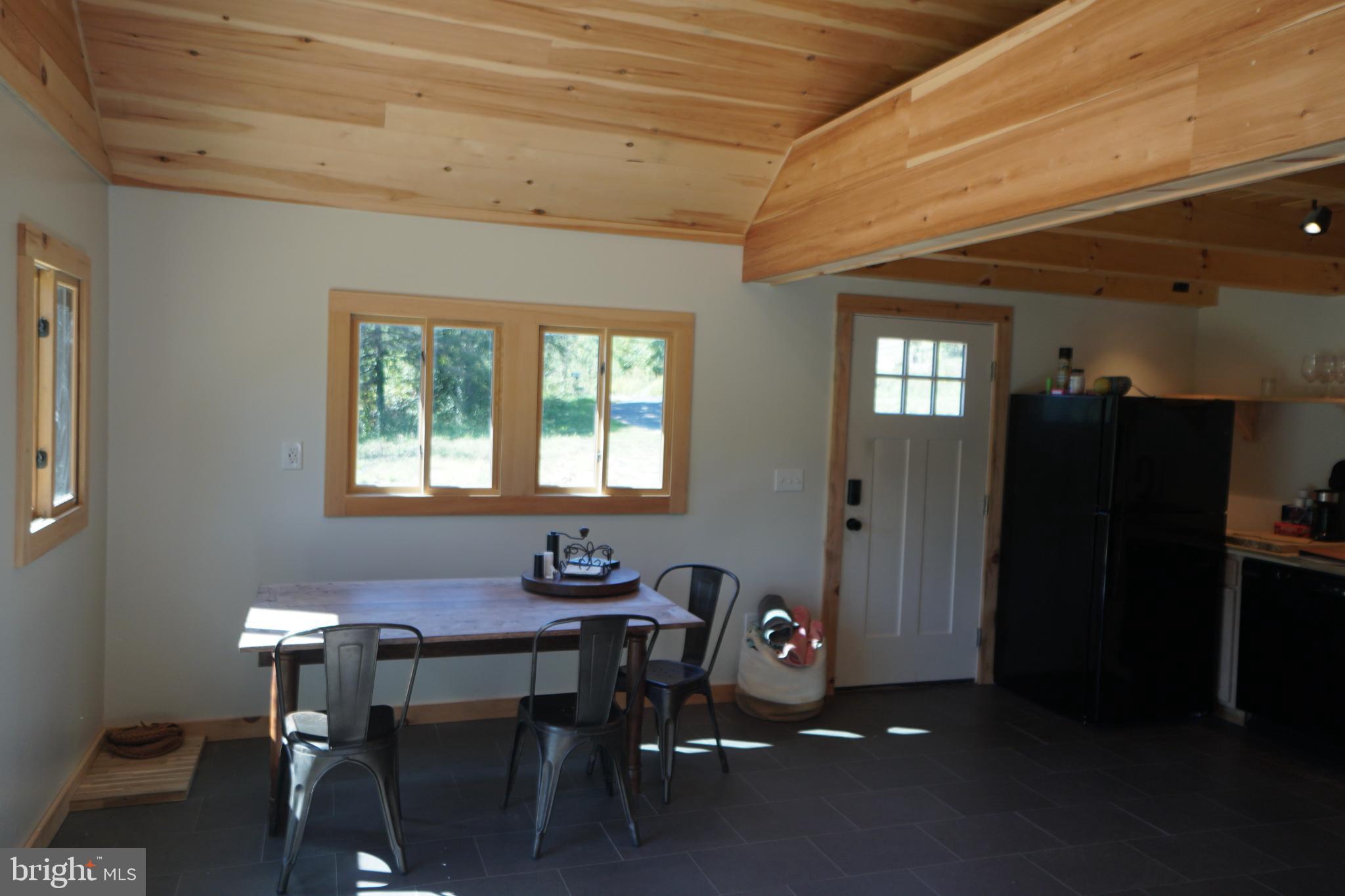 789 Upper South Branch Road Franklin, WV 26807 - Photo 22 of 50 a workspace with furniture and window