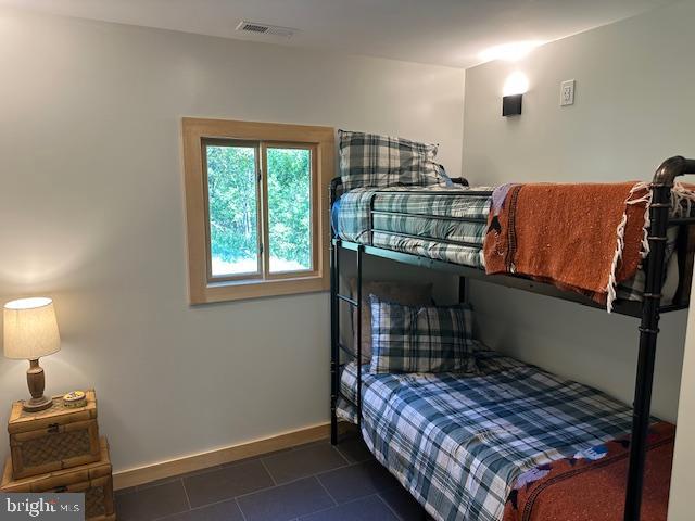 789 Upper South Branch Road Franklin, WV 26807 - Photo 23 of 50 a bedroom with a bed and a window