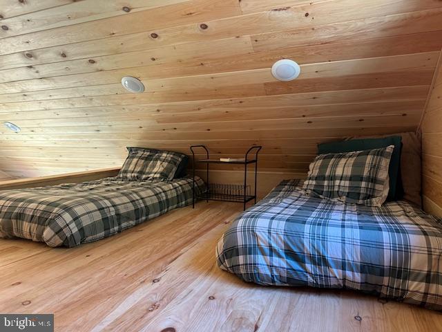 789 Upper South Branch Road Franklin, WV 26807 - Photo 28 of 50 a bedroom with a bed and cabinets