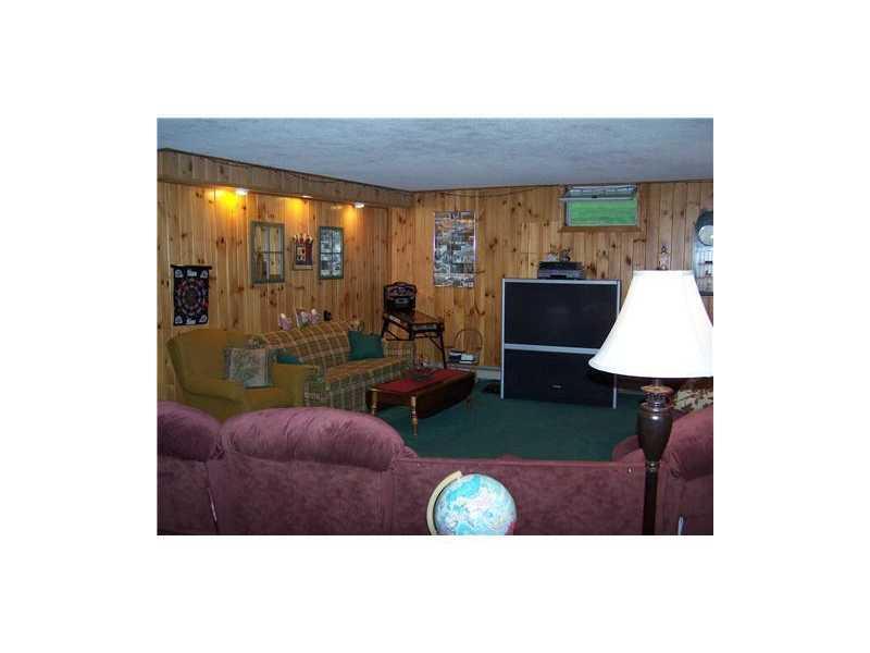 63 Crawford Road Dexter, ME 04930 - Photo 21 of 25 Den/Family/Great Room.