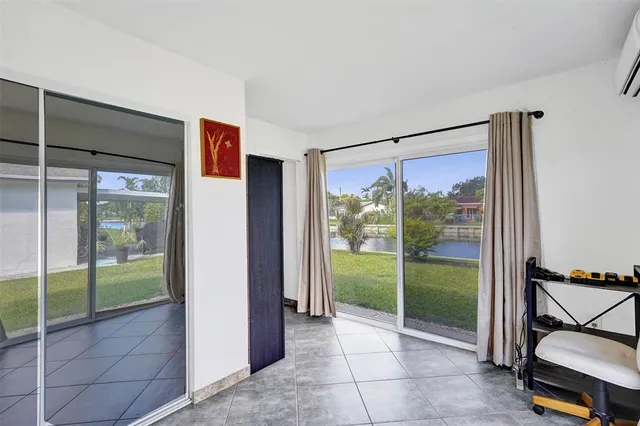 a view of room with window and a living room