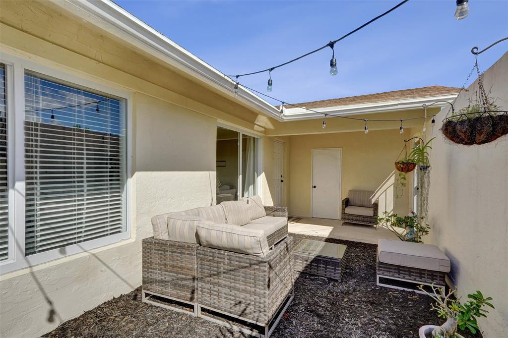7003 Northwest 95th Terrace Tamarac, FL 33321 - Photo 8 of 44 a living room with furniture