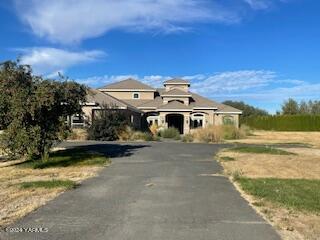 2104 Birchfield Road Yakima, WA 98901 - Photo 1 of 4 a view of a water with building in the background