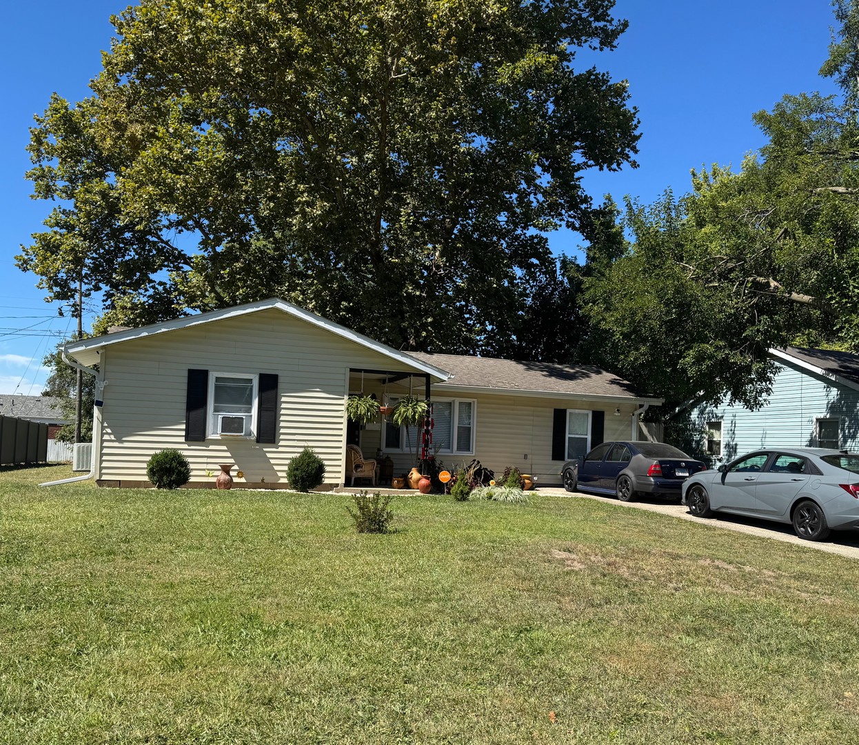 1503 Summit Ridge Road Champaign, IL 61821 - Photo 1 of 1 a front view of a house with a yard and trees