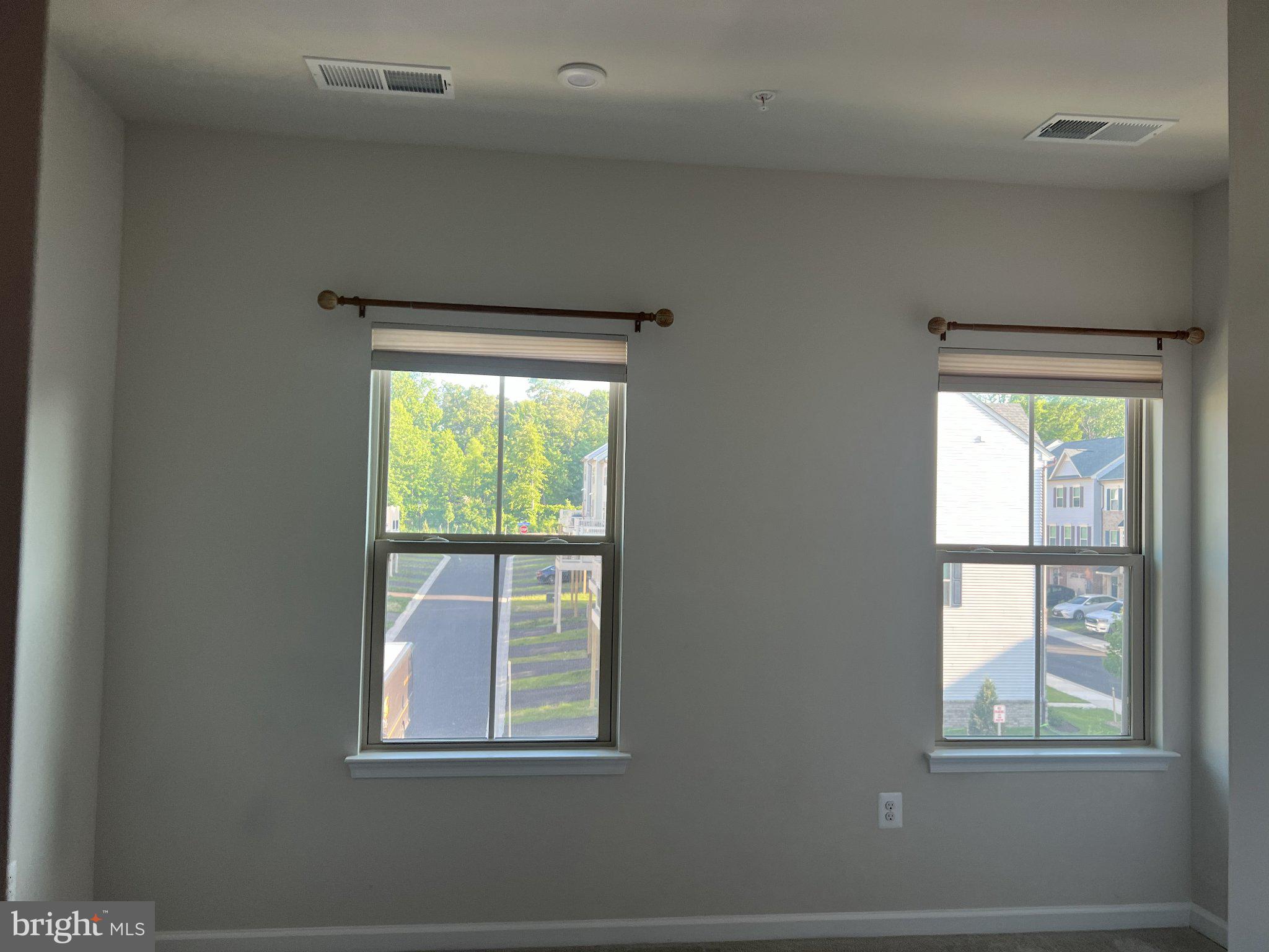 8058 Big Roundtop Road Fort George G Meade, MD 20755 - Photo 18 of 24 a view of an empty room with a window