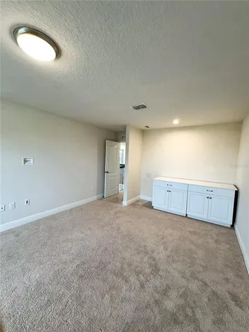 an empty room with a natural light