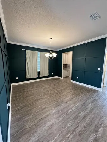 a view of a livingroom with a chandelier