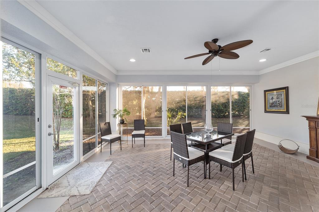 13625 Southeast 93rd Court Road Summerfield, FL 34491 - Photo 1 of 1 a living room with furniture and a large window