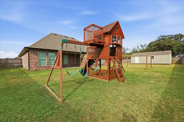 a view of a house with a park