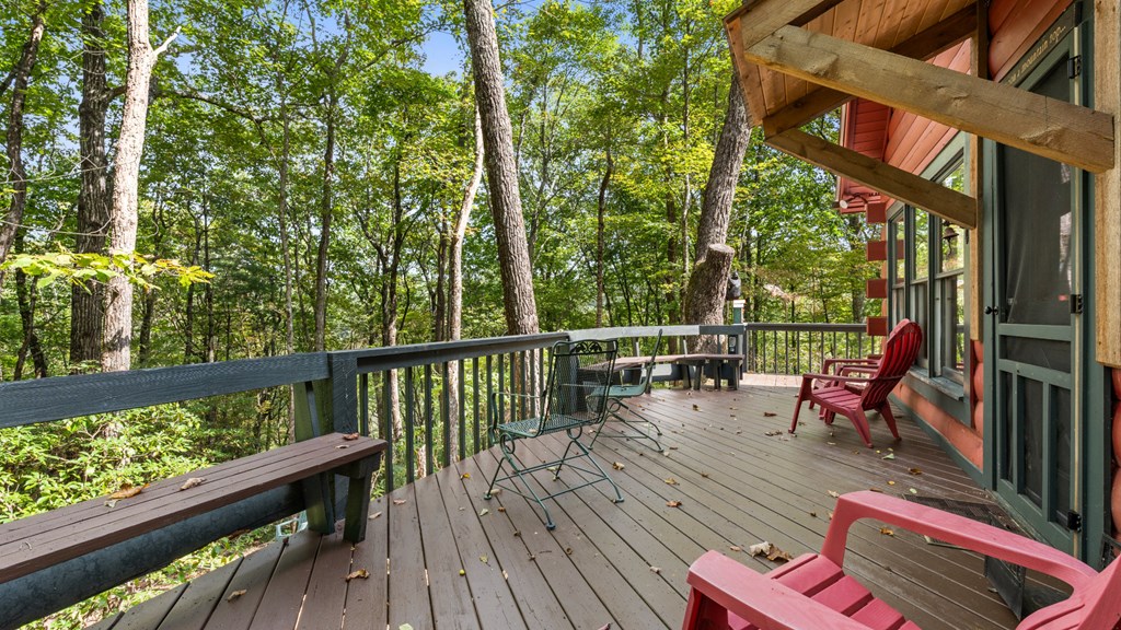 390 Butler Creek Road Cherry Log, GA 30522 - Photo 18 of 20 a view of balcony with wooden floor and outdoor seating