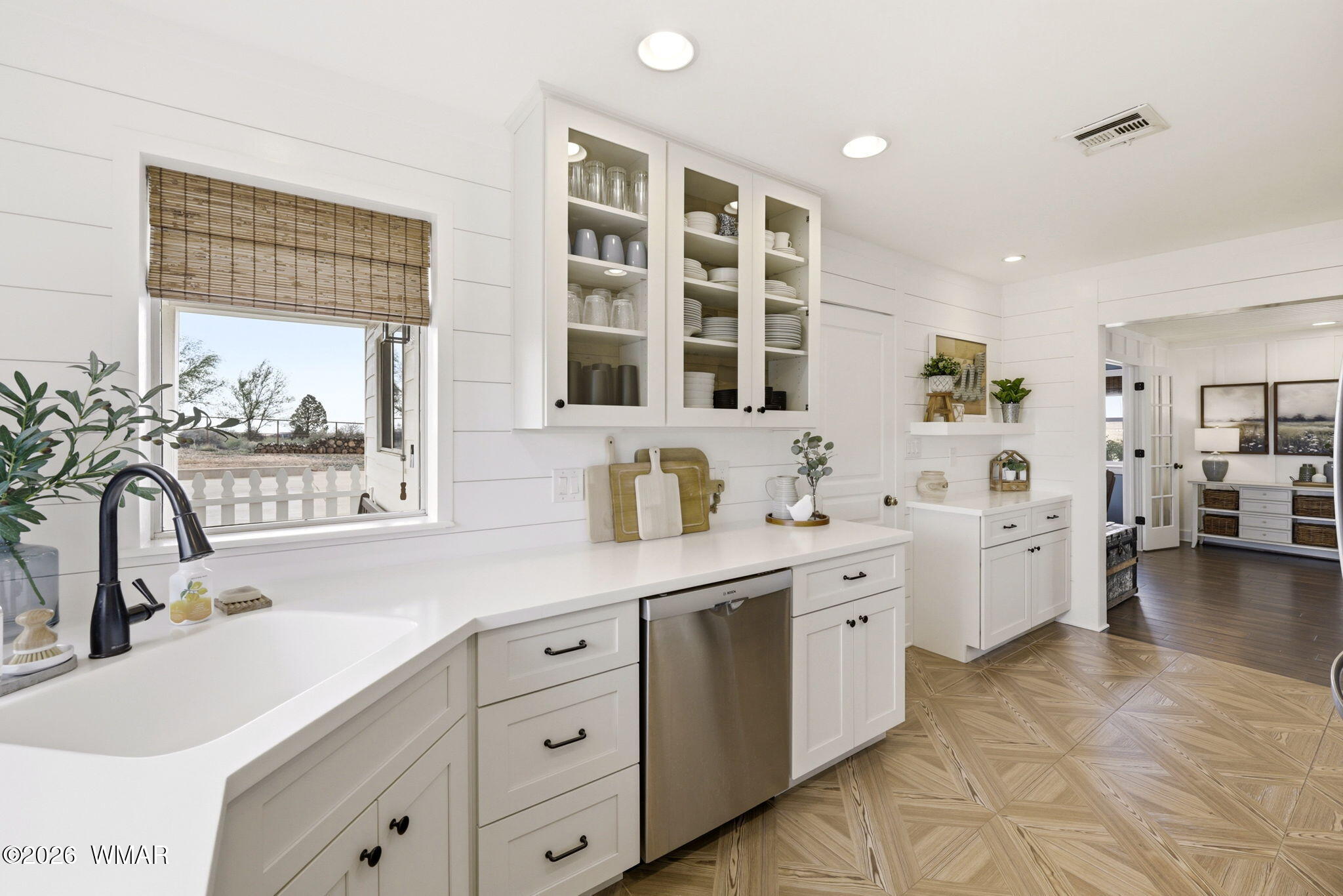 1491 Hunsaker Road Holbrook, AZ 86025 - Photo 11 of 40 a large white kitchen with cabinets