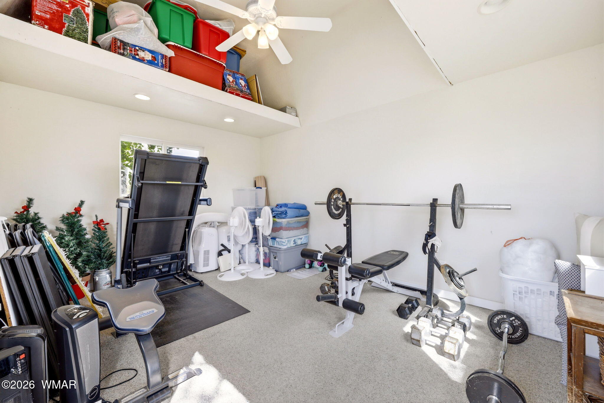 1491 Hunsaker Road Holbrook, AZ 86025 - Photo 29 of 40 a view of a room with gym equipment