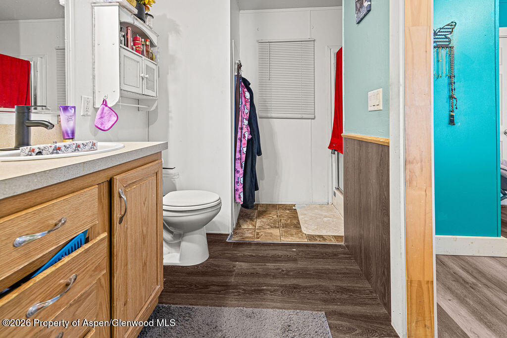 925 West 1st Street, Unit 511 Craig, CO 81625 - Photo 11 of 28 a bathroom with a sink toilet and a shower