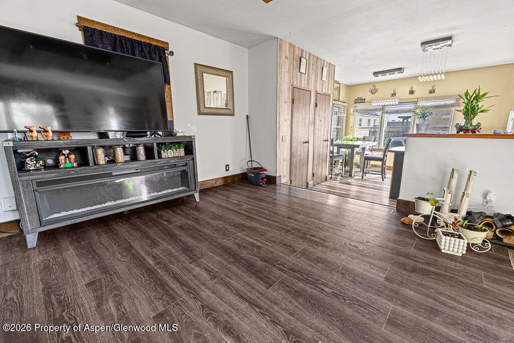 925 West 1st Street, Unit 511 Craig, CO 81625 - Photo 2 of 28 a living room with furniture and a flat screen tv
