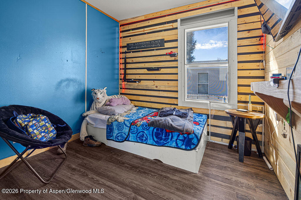 925 West 1st Street, Unit 511 Craig, CO 81625 - Photo 21 of 28 a living room with furniture and a window