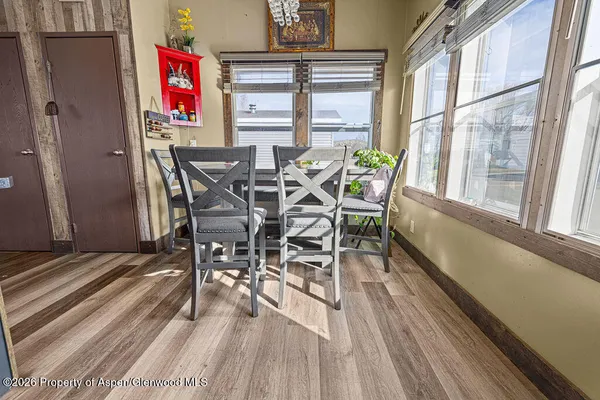 a view of a dining room with furniture window and outside view
