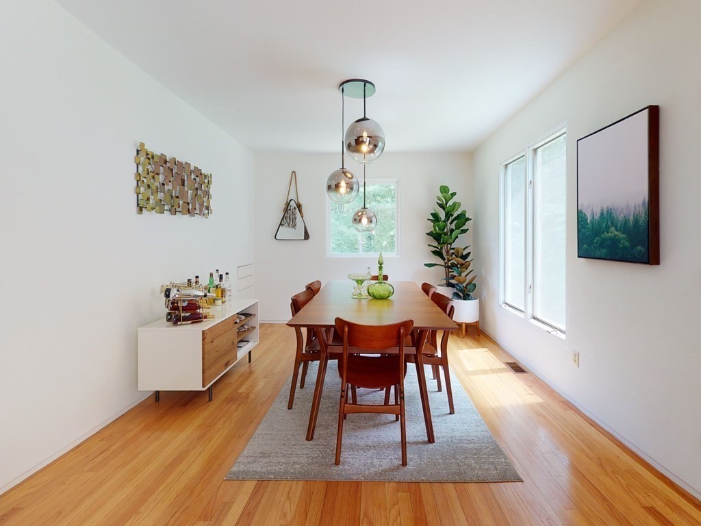 73 Bolton Road Harvard, MA 01451 - Photo 6 of 28 a view of a dining room with furniture window and wooden floor
