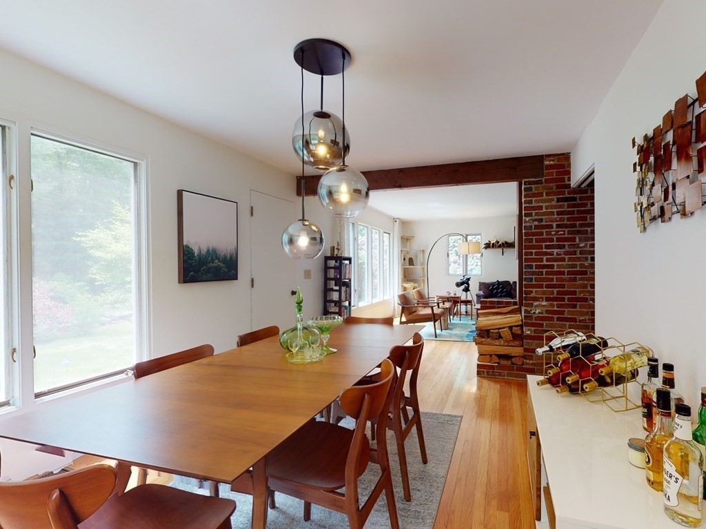 73 Bolton Road Harvard, MA 01451 - Photo 8 of 28 a view of a dining room with furniture and wooden floor