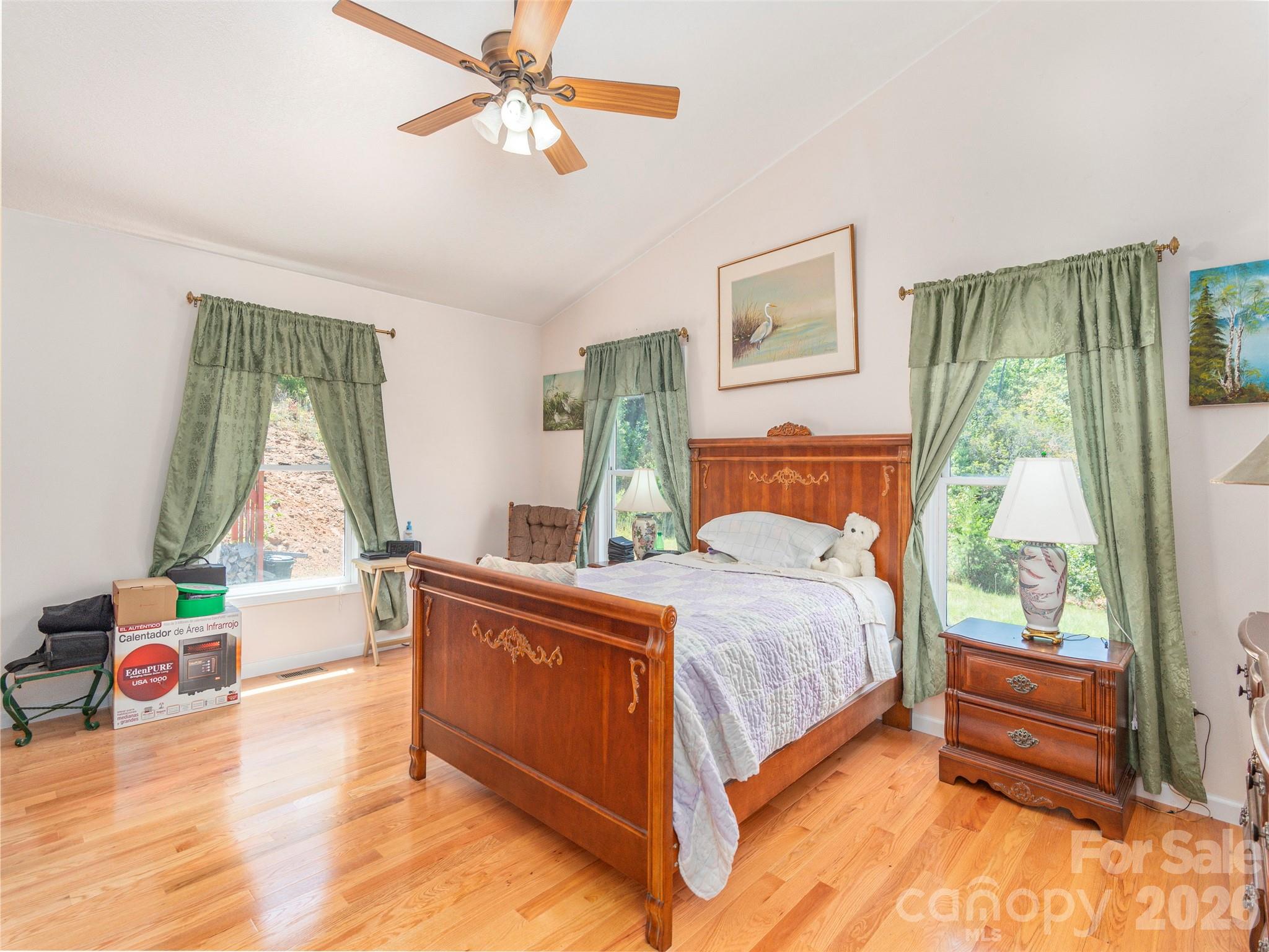 1120 Jacobs Branch Road Franklin, NC 28734 - Photo 14 of 36 a bedroom with a bed and a window