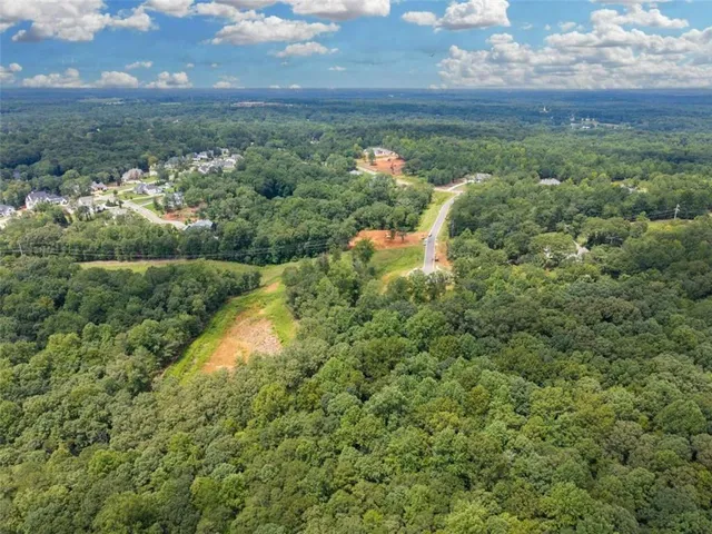 a view of a lake with a city view