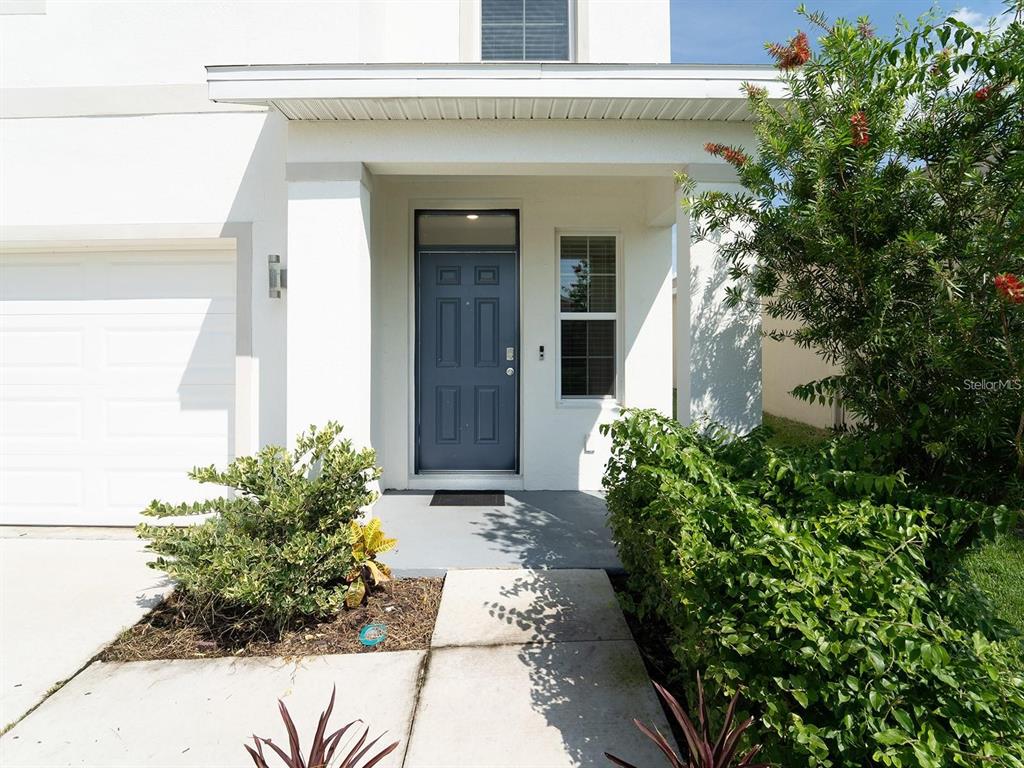 5510 Oxford Gray Road Wesley Chapel, FL 33545 - Photo 13 of 41 a view of a pathway besides a house