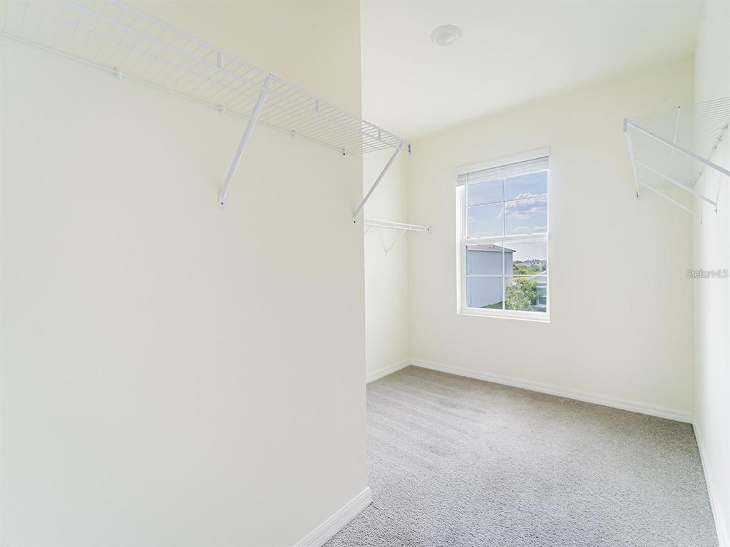5510 Oxford Gray Road Wesley Chapel, FL 33545 - Photo 24 of 41 a view of an empty room with a window