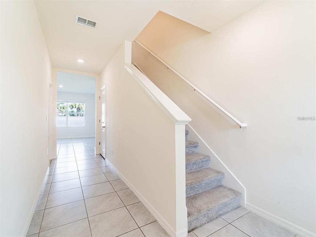 5510 Oxford Gray Road Wesley Chapel, FL 33545 - Photo 31 of 41 a view of entryway and hall with a window