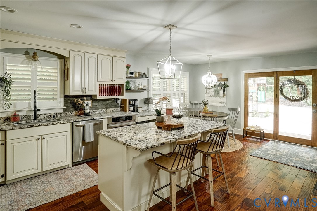 1174 Dorset Road Powhatan, VA 23139 - Photo 10 of 38 Kitchen featuring white cabinetry, granite counter