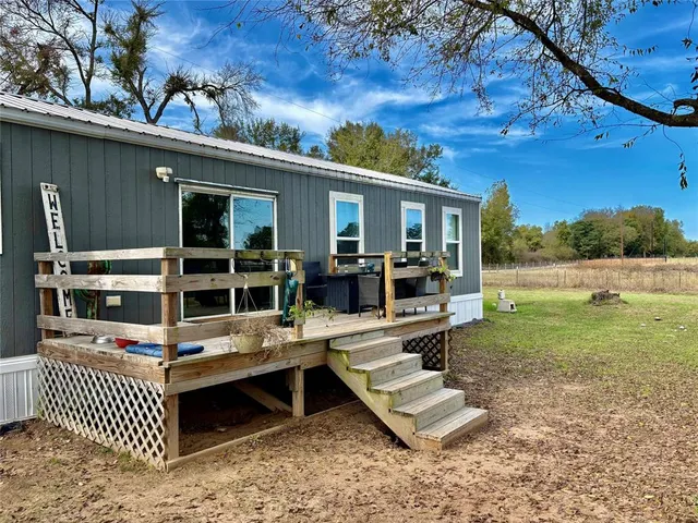 front view of house with a yard