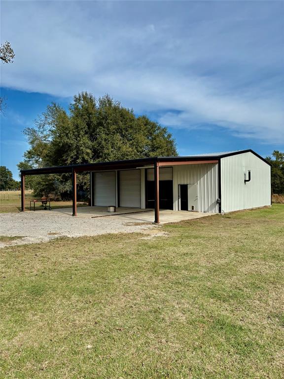 184 Fcr 941 Teague, TX 75860 - Photo 5 of 26 a front view of a house with a garden