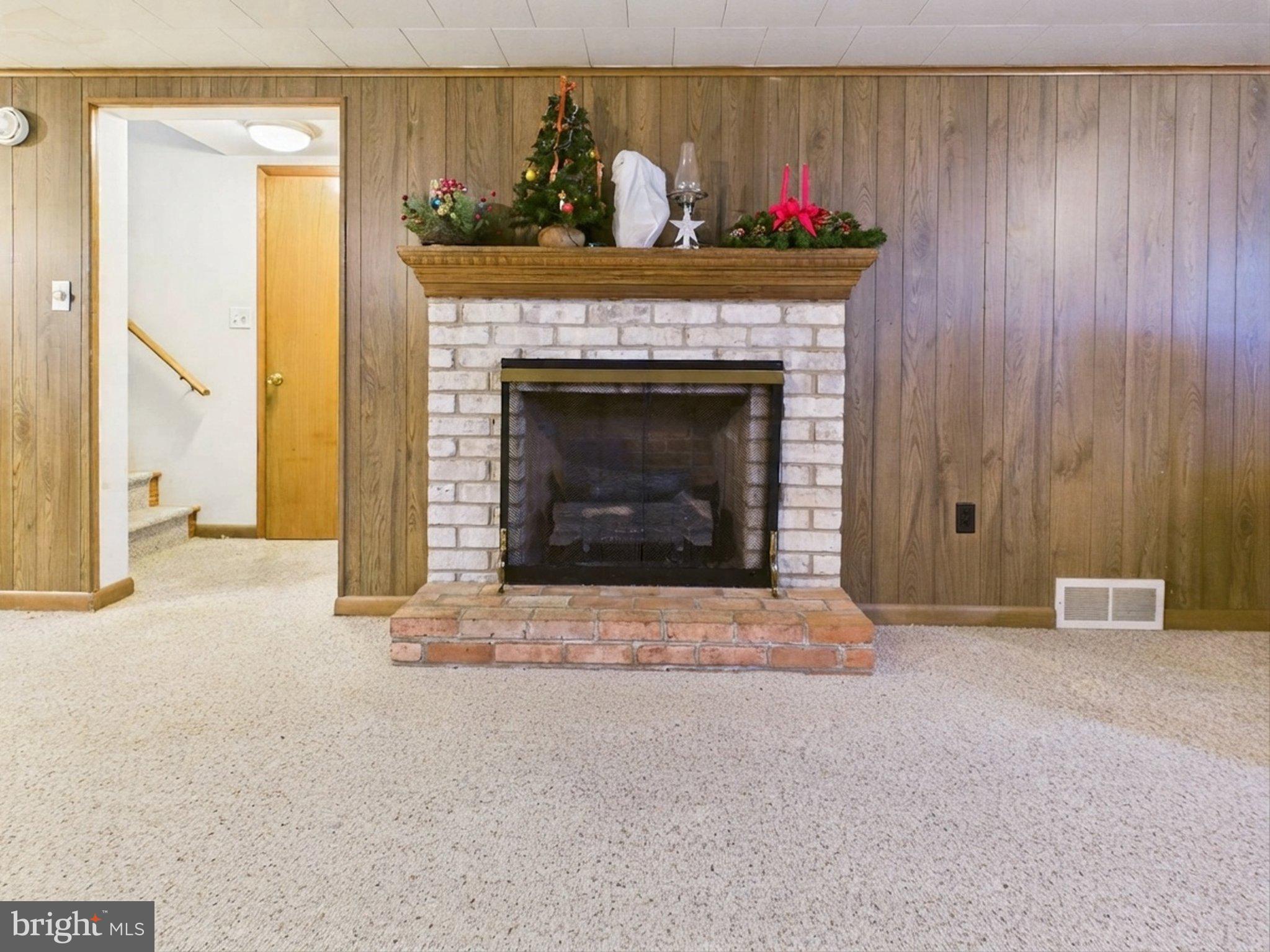347 George Street Hanover, PA 17331 - Photo 34 of 42 Cozy fireplace with rustic charm.