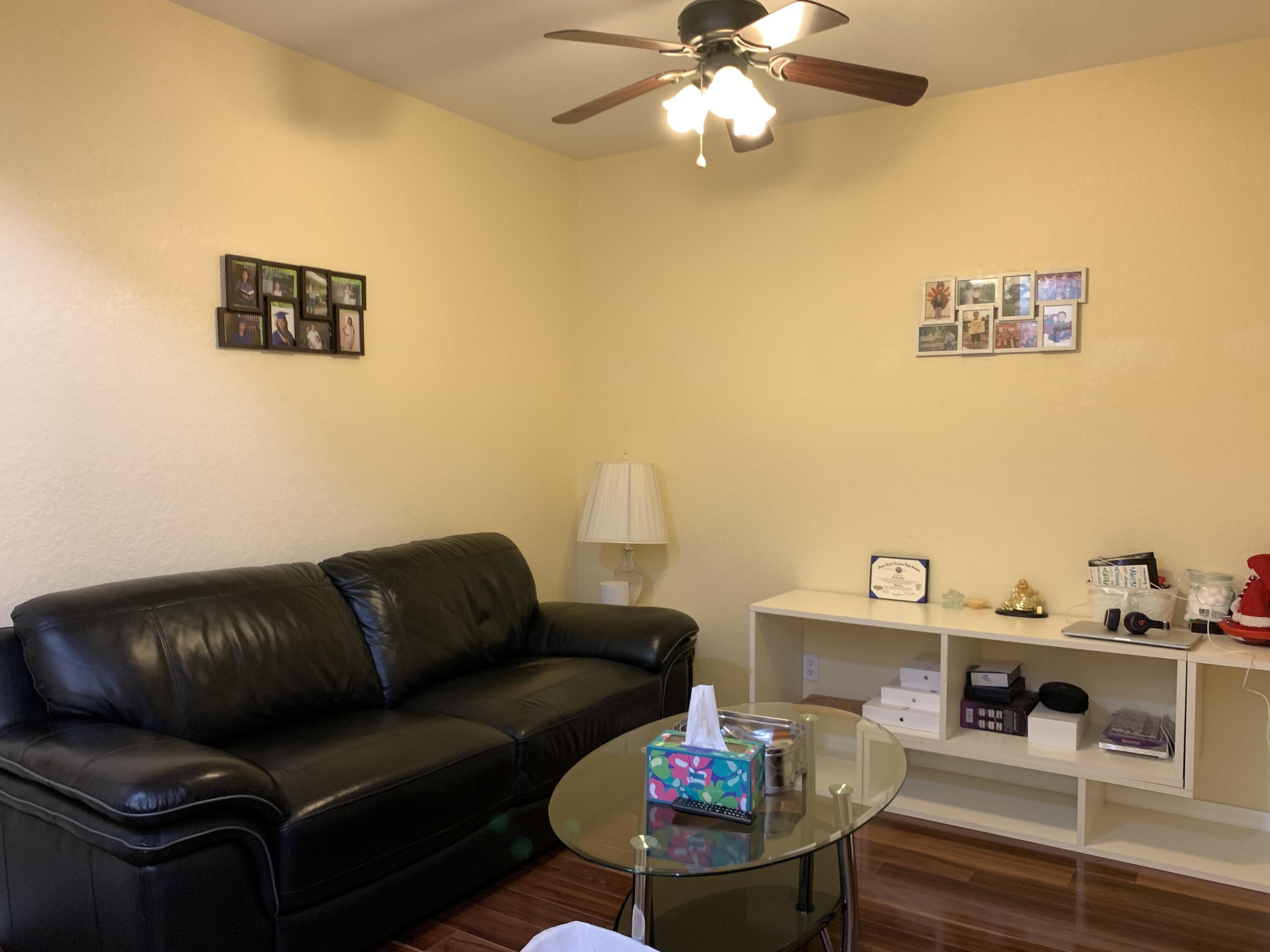 2304 Center Stone Lane Riviera Beach, FL 33404 - Photo 8 of 15 a living room with furniture and a flat screen tv