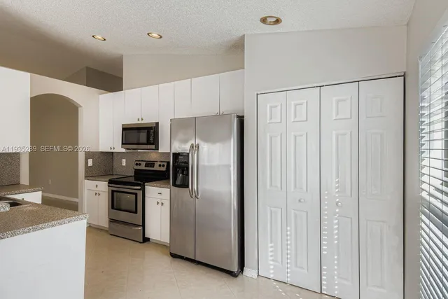 $686,000 | 14242 Northwest 18th Place, Pembroke Pines, FL 33028