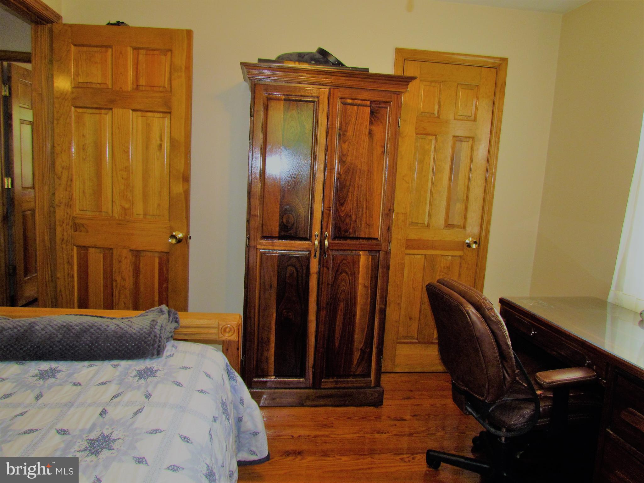 6442 Mt Phillip Road Frederick, MD 21703 - Photo 15 of 37 a bedroom with a bed and a closet