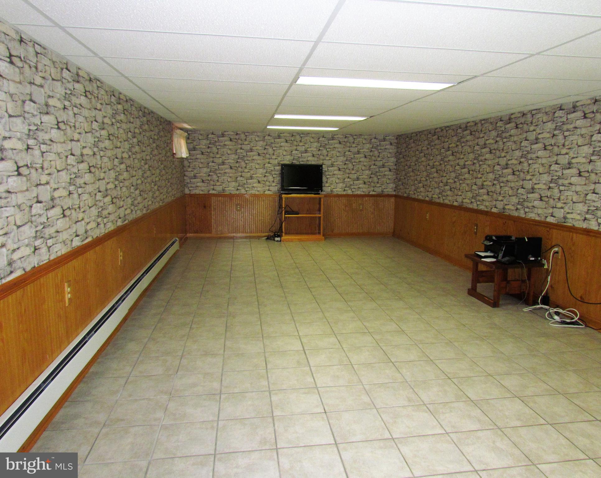 6442 Mt Phillip Road Frederick, MD 21703 - Photo 23 of 37 a view of empty room with wooden floor