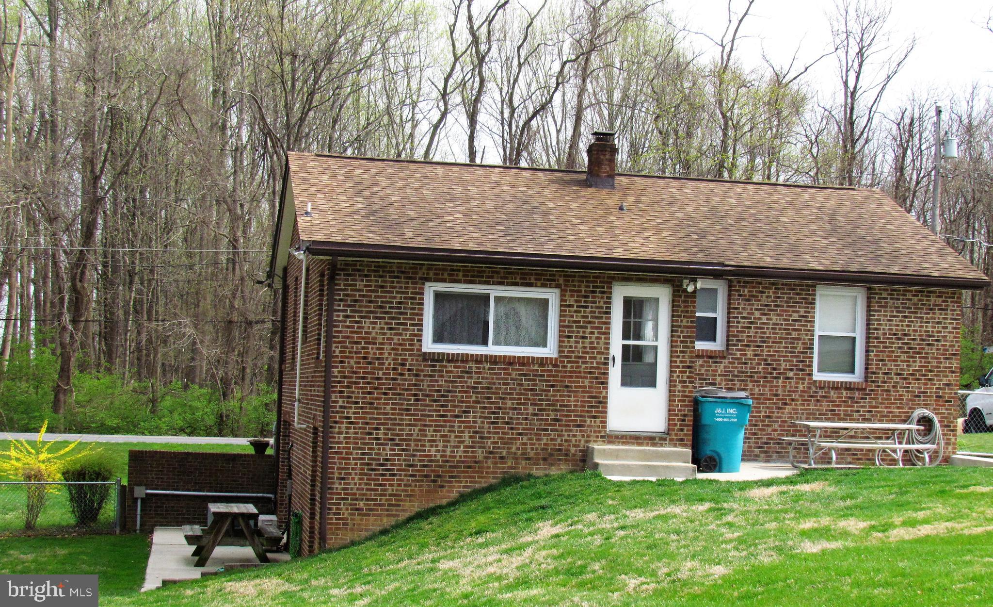6442 Mt Phillip Road Frederick, MD 21703 - Photo 26 of 37 a view of house with yard
