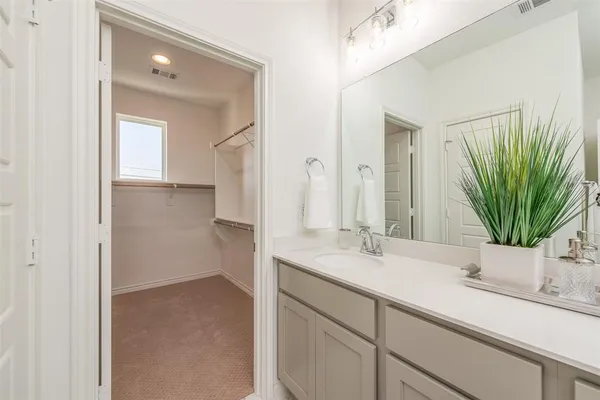 a view of an empty walk in closet