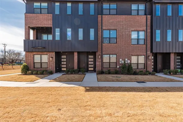 a view of a hallway with front door
