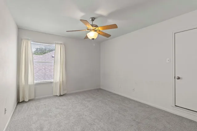 a view of a backyard with a small cabin