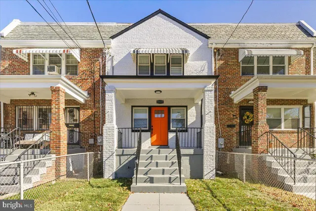 a front view of a house with a porch