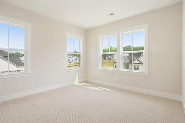 an empty room with windows