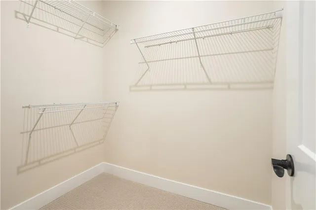 a view of a room with racks on the wall